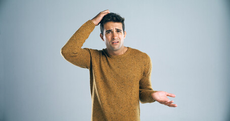 Aufkleber - Man, doubt and scratch head in studio portrait for decision, lost or problem solving by background. Person, confused and choice by mockup space for crisis, stress or error with wondering for solution