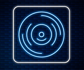 Poster - Glowing neon line Vinyl disk icon isolated on brick wall background. Vector