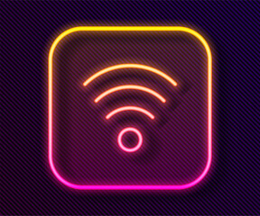 Poster - Glowing neon line Wi-Fi wireless internet network symbol icon isolated on black background. Vector