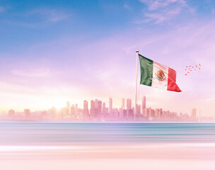 Wall Mural - Mexico national flag waving with scenic view of modern skyline. Mexico independence day waving flag in beautiful skyline.