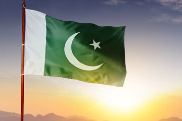 Pole with Pakistan flag waving in the air