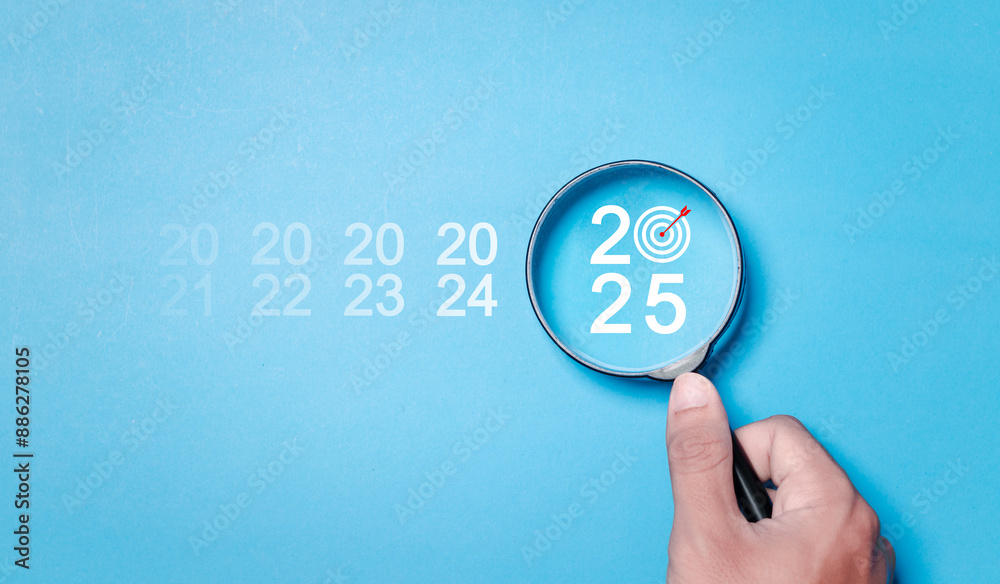 Happy new year 2025 for business target concept. magnifying glass focus ...