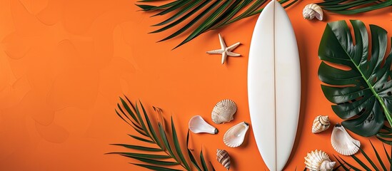 Poster - Summer concept featuring a surfboard palm leaves and seashells on an orange backdrop perfect for copy space image
