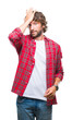 © Krakenimages.com - Handsome hispanic model man over isolated background surprised with hand on head for mistake, remember error. Forgot, bad memory concept.
