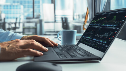 Aufkleber - Close-Up On Hands Of Professional Financial Analyst Using Laptop Computer With Stock Options Graphs And Charts On Screen. Man Analyzing Stock Market Data And Enjoying Coffee In Hedge Fund Office.