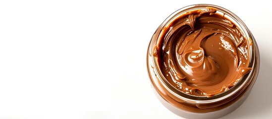 Leinwandbilder - Chocolate peanut butter spread in a glass jar isolated on a white background with a blank space for adding text or other elements in the image. with copy space image. Place for adding text or design