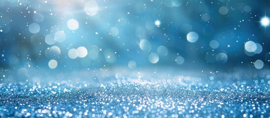 Fototapete - A sparkling blue background with glitter shining in the sunlight leaving space for text. with copy space image. Place for adding text or design