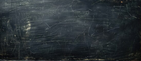 Poster - Empty black chalkboard with chalk traces suitable as a copy space image