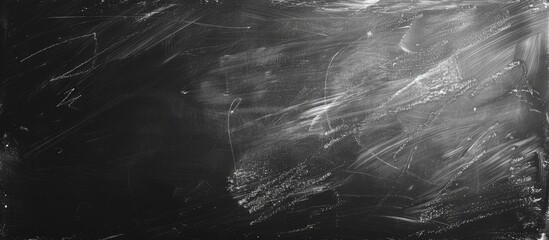 Poster - Chalk smudges on blackboard creating a textured background leaving copy space image