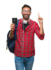 Sticker - Adult hispanic student man holding passport of australia over isolated background surprised with an idea or question pointing finger with happy face, number one