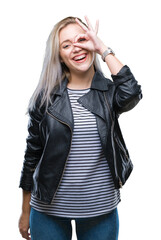 Sticker - Young blonde woman wearing fashion jacket over isolated background doing ok gesture with hand smiling, eye looking through fingers with happy face.