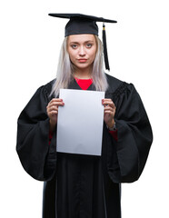 Poster - Young blonde woman wearing graduate uniform holding degree over isolated background with a confident expression on smart face thinking serious