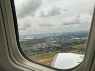 Wall Mural - Picturesque view through plane window during flight