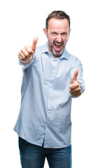 Sticker - Middle age hoary senior business man over isolated background approving doing positive gesture with hand, thumbs up smiling and happy for success. Looking at the camera, winner gesture.