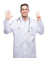 Canvas Print - Handsome young doctor man showing and pointing up with fingers number seven while smiling confident and happy.