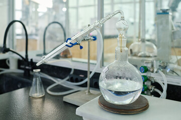 Poster - Process of vaporization of liquid chemical substance in order to get new solid one on workplace of modern scientist during experiment