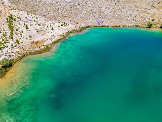 Wall Mural - The aerial views of Green Lake, a crater lake, is on the Gömbe Plateau, famous for its unique geographical riches.