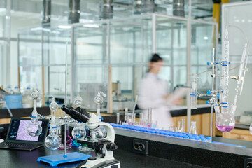 Aufkleber - Microscope, glassware, laptop and other stuff necessary for scientific experiments standing on workplace of modern clinician