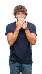 Sticker - Handsome hispanic model man over isolated background shocked covering mouth with hands for mistake. Secret concept.