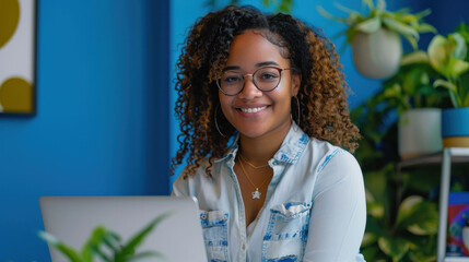 Poster - Woman with glasses smiling in a home office