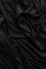 Poster - Close-up view of black fabric with intricate texture folds. Fabric appears worn with frayed edges adding wear. Used as abstract background for fashion design, textile industry, eco-friendly products.