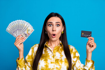 Sticker - Photo of adorable lovely elegant successful woman wear trendy blouse pay buy cash card isolated on blue color background