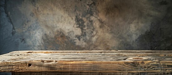 Poster - an old rustic wood table with a unique texture on the tabletop perfect for a copy space image