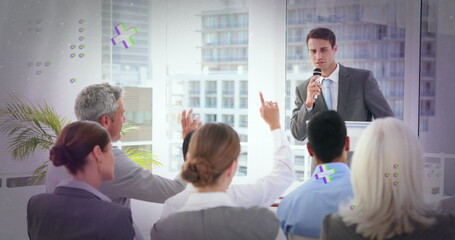Poster - Image of abstract shapes over caucasian businessman asking question at business conference