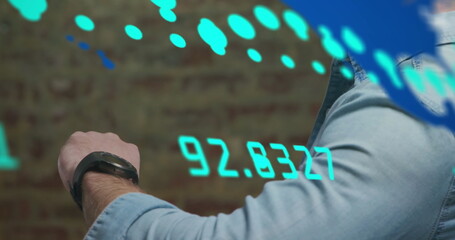 Poster - Image of financial data processing over caucasian businessman checking smartwatch