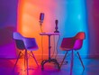 © Rusti_video & image - Two chairs and a table in a room with neon lighting.