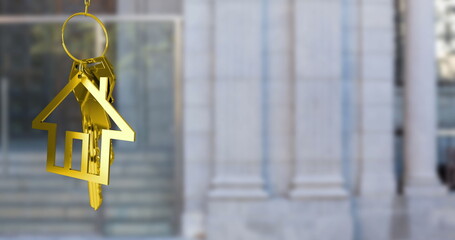 Poster - Image of hanging golden house keys against blurred view of building entrance with copy space