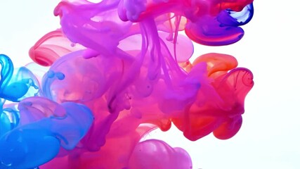 Poster - Pink, blue, and purple ink swirl and mix in a clear liquid, creating abstract patterns.