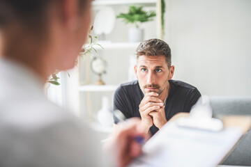 Man with psychologist theraphy social problems concept drug addiction talk to a psychological woman
