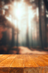 Wall Mural - empty wooden table top with space for products.with blurred autumn sunlight in woods background.