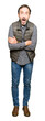 © Krakenimages.com - Middle age handsome man wearing winter vest afraid and shocked with surprise expression, fear and excited face.