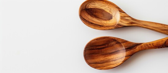 Aufkleber - Image of two wooden spoons on a white backdrop with ample copy space.