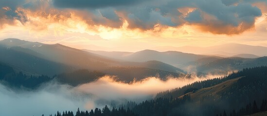 Poster - A stunning sunrise in the mountains with a large fog floating over the high mountain scenery, creating a captivating copy space image.