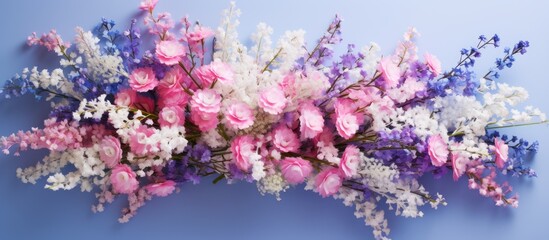 Aufkleber - A festive bouquet with gently colored gypsophila flowers in purple, pink, and white hues, wrapped in blue paper, creating an elegant arrangement with captivating aesthetics in a copy space image.