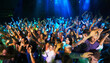 © ArcursPI/peopleimages.com - Enjoying every song the band plays. Shot of a large crowd at a music concert.