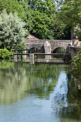 Wall Mural - Scenic view of Eure River banks and houses in Historic Center of Chartres. Chartres, Eure-et-Loir department, Centre-Val de Loire region, France, Europe.