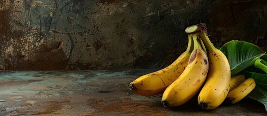 Canvas Print - Bananas displayed on a rustic kitchen table with copy space image.