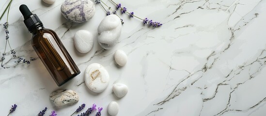 Sticker - On a marble table, there are stones, a bottle of essential oil, lavender flowers, and a spacious area for text in the image.