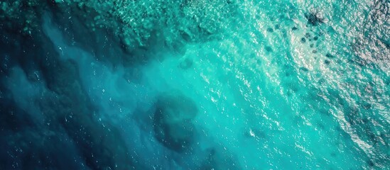 Poster - Aerial perspective of a serene blue ocean with paper on the surface, providing a clean copy space image.