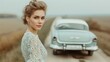 © SuriyaPhoto - Pensive Woman Stands beside Vintage Car in Countryside Landscape