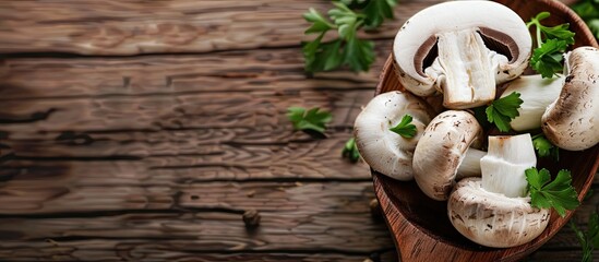 Poster - Wooden spoon holding fresh champignon slices with parsley, perfect for cooking delightful dishes with white mushrooms. Ideal for a copy space image.