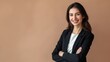 © gn8 - Confident Greek Businesswoman in Professional Suit Posing Against Neutral Background