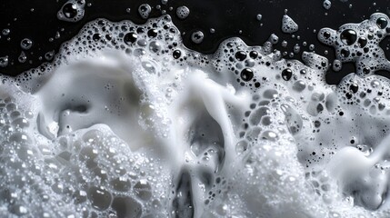 Poster - A close-up shot of water bubbles forming and popping on the surface
