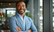 © Carmen - Portrait of handsome African-American businessman in office setting with natural light, copy space