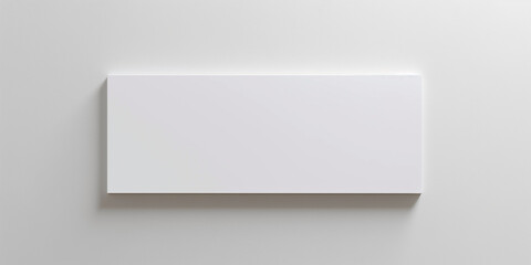 Poster - White horizontal rectangular canvas hanging on white wall with a shadow