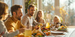 © HelgaQ - Friendly family enjoying breakfast together in a sunlit dining room, fresh and healthy food, bonding moments concept
